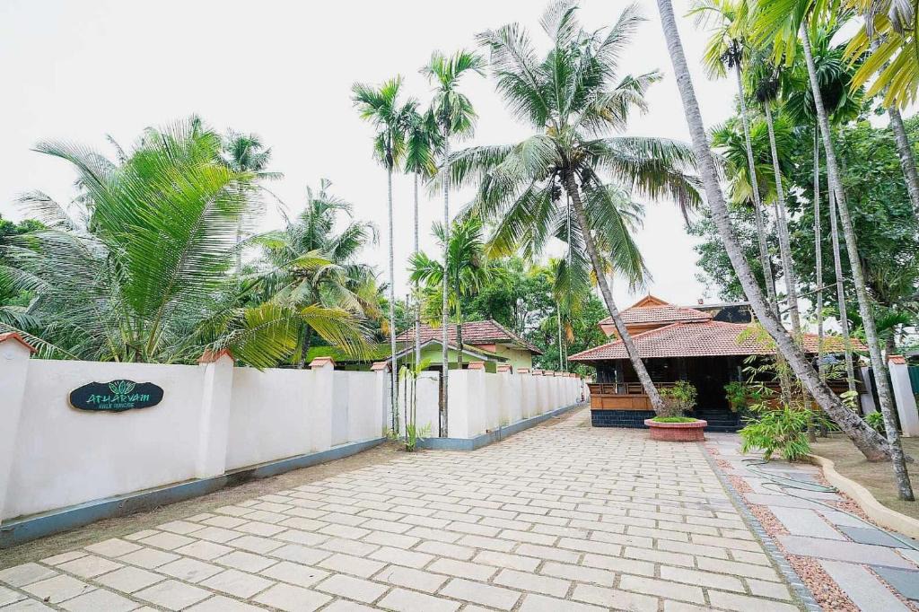 North Paravur Hotel | Hotel O ATHARVAM RESORT