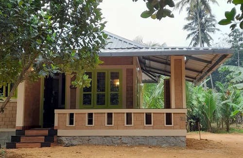 Nedumangad Cottage | A tranquil, riverside earthen home for a comfortable and peaceful stay