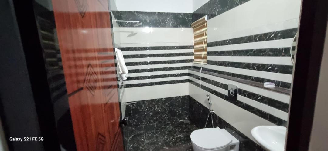 Photo of Bathroom in Kainakary